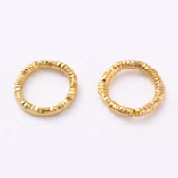 4046 Bindring guld HEL tvinnad 7,5mm 50stk