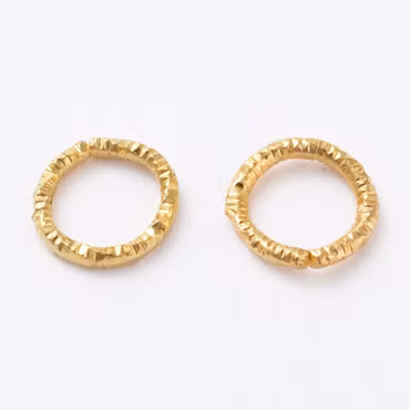4046 Bindring guld HEL tvinnad 7,5mm 50stk