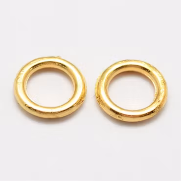 4054 Bindring guld HEL 7x1mm hål 4,5mm 50stk