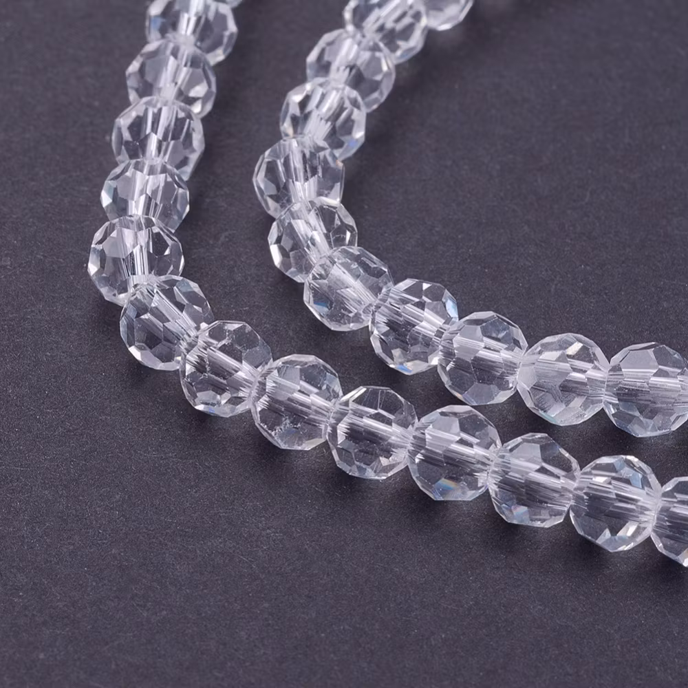 4136 Glaspärla fasett rund transparent 4mm