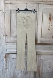 Ribbstickade byxor beige