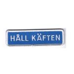 Håll Käften vägskylt
