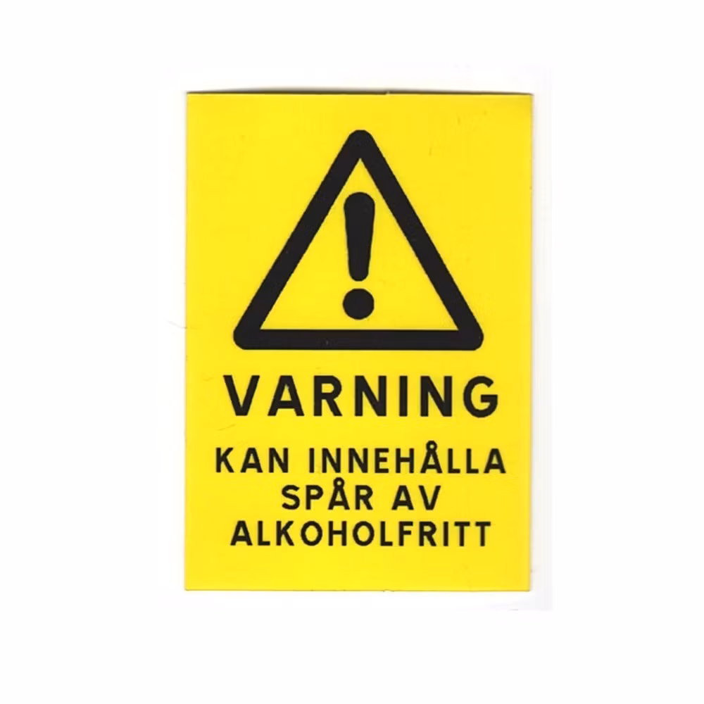 Varning, kan innehålla spår av alkoholfritt - Klistermärke