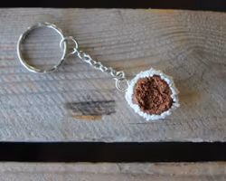 Keychain, chocolate ball with pearl sugar with bite
