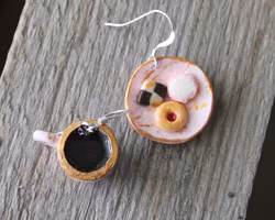 Earrings, pink cookie plate with coffee cup