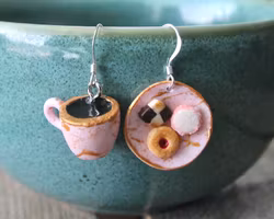 Earrings, pink cookie plate with coffee cup