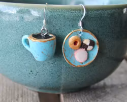 Earrings, blue cookie plate with coffee cup