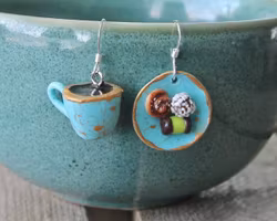 Earrings, blue coffee plate with coffee cup