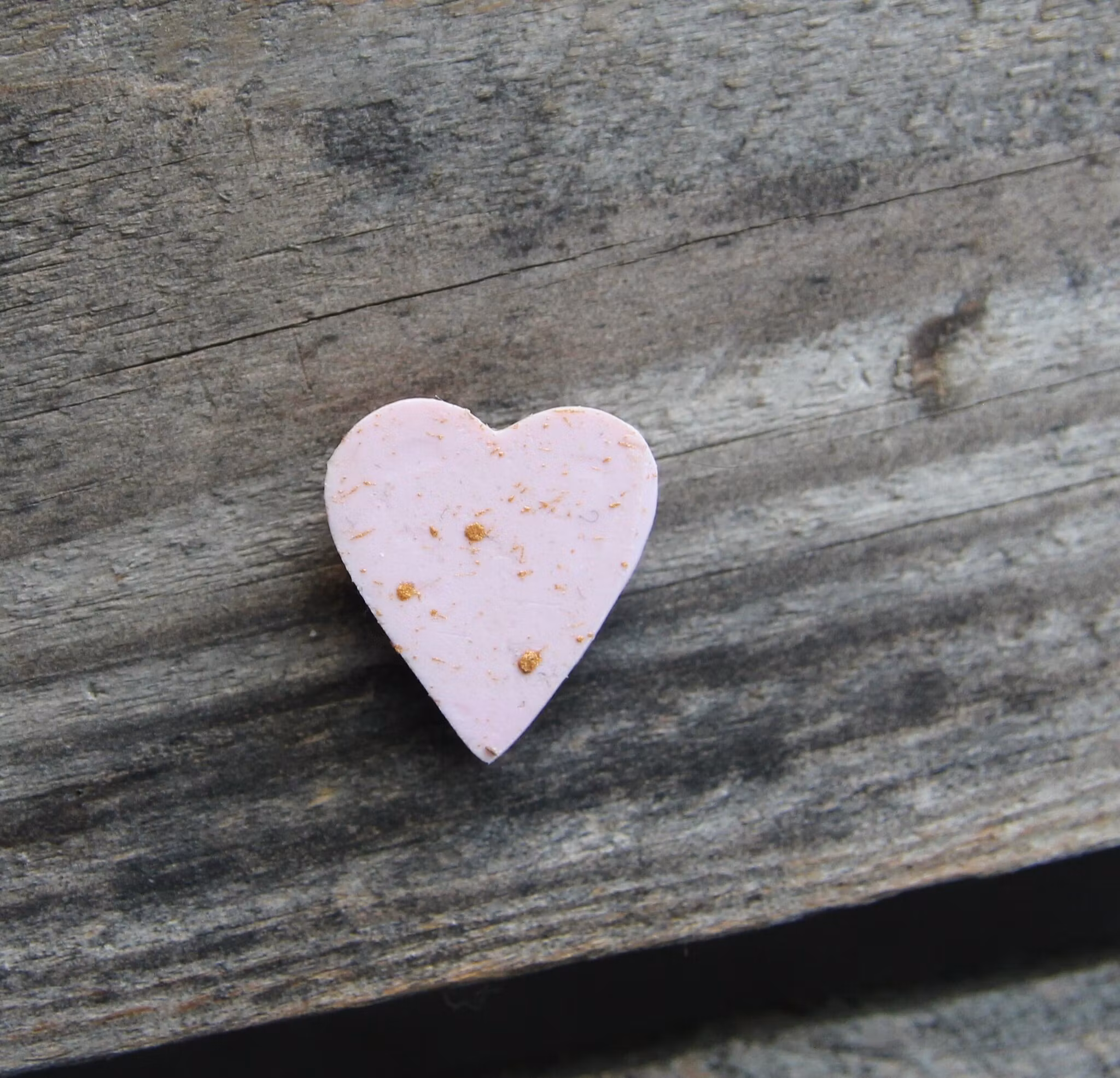 Earrings, blue coffee plates with vacuum cleaner, chocolate ball and cinnamon bun