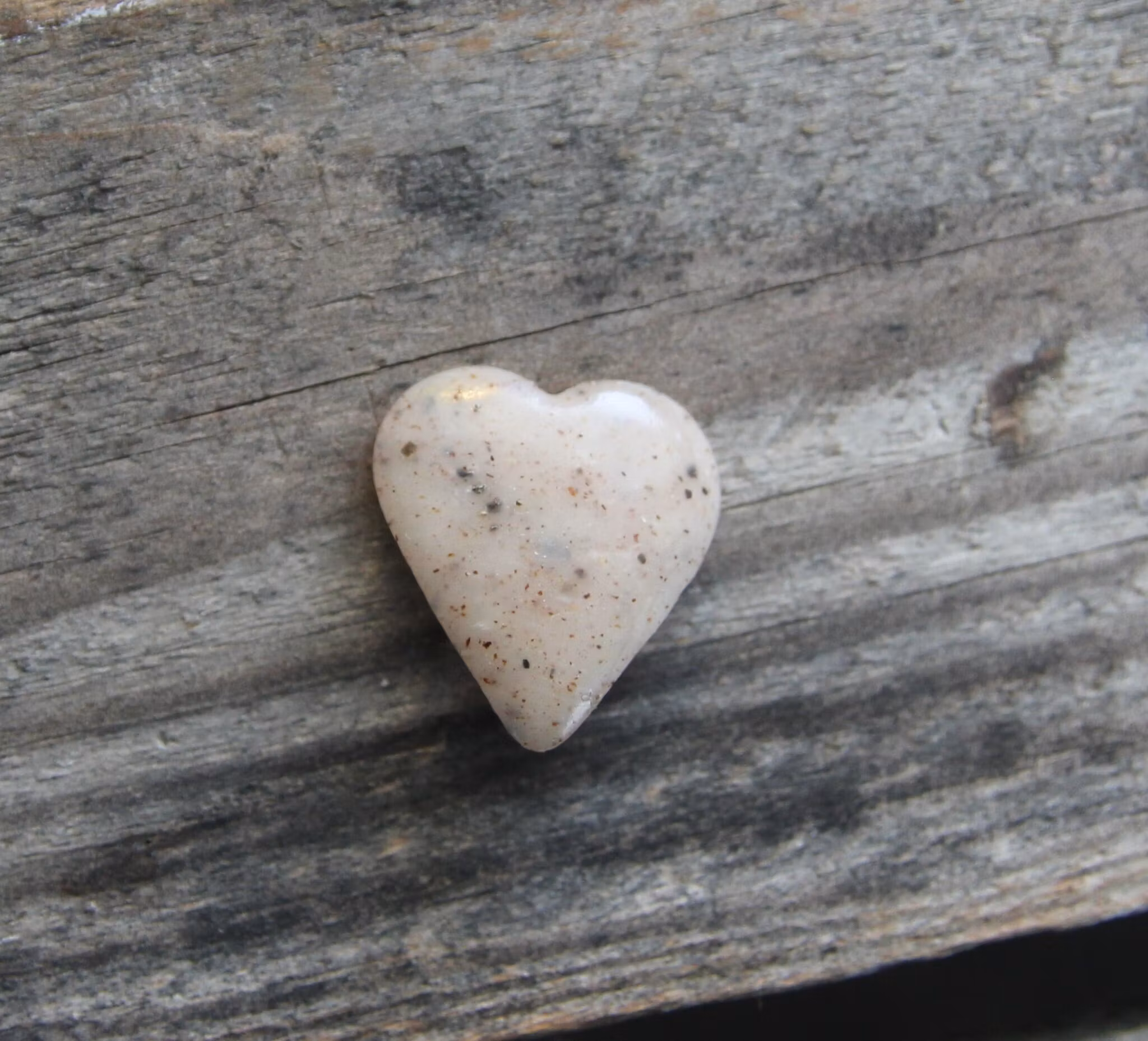 Earrings, blue coffee plates with vacuum cleaner, chocolate ball and cinnamon bun
