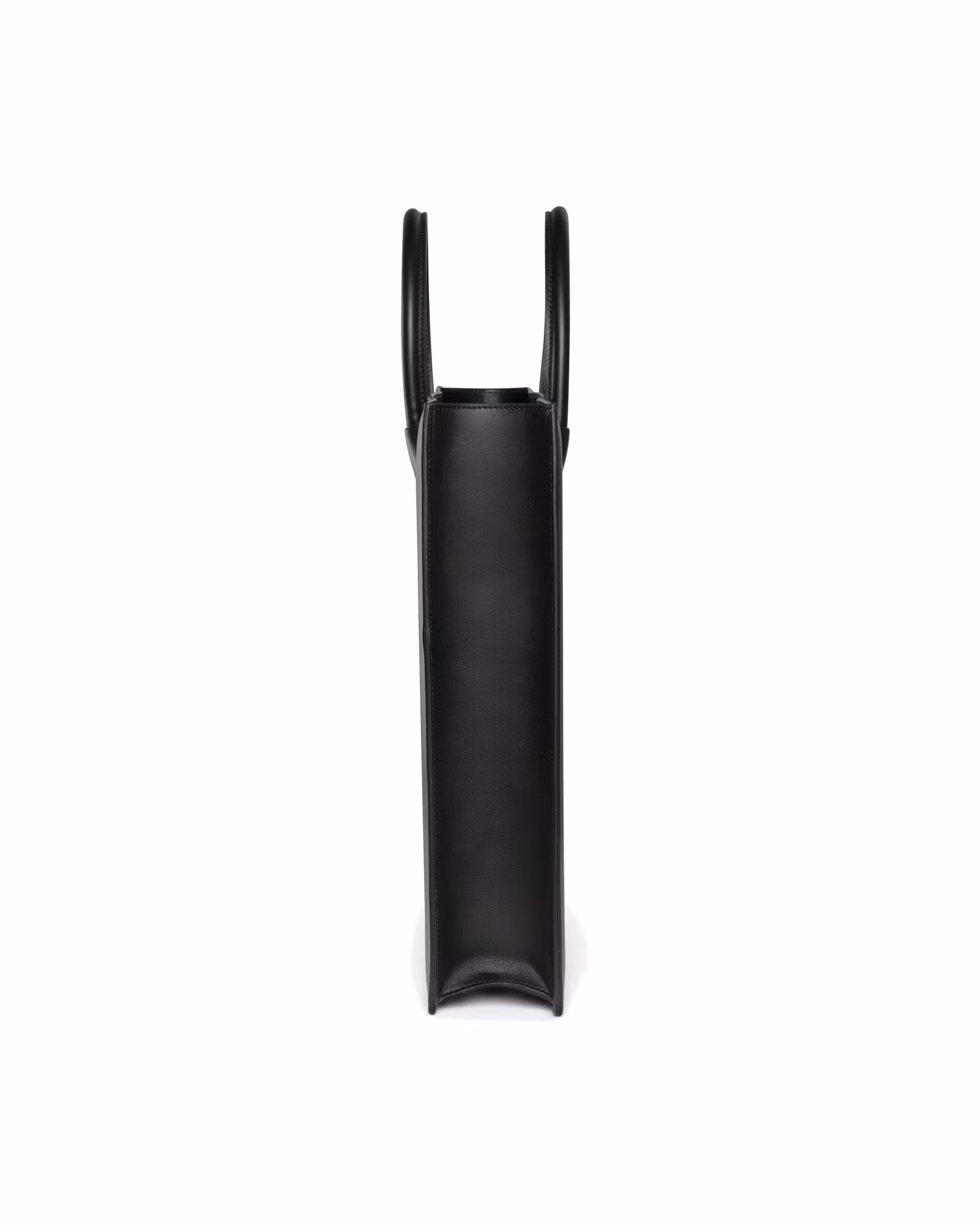 ANTON ALICE Tote Bag No 1 structured leather tote in black, side view showing the slim profile