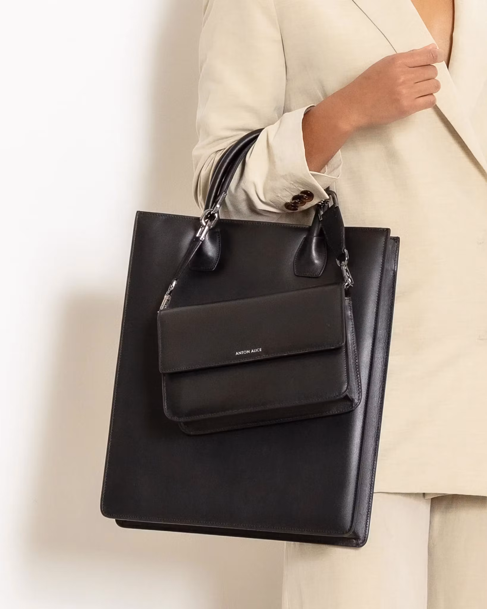 ANTON ALICE Tote Bag No 1 Zip leather tote in black, worn by a model
