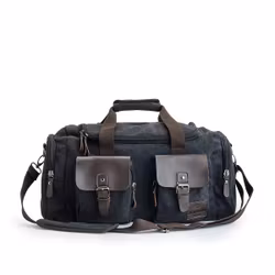 SNYGG TRENDIG DUFFELBAG MED IMITATIONSLÄDER FRÅN SUTHERLAND & SONS – SVART