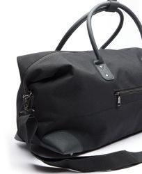 Trendig Duffelbag från Sutherland & sons – svart