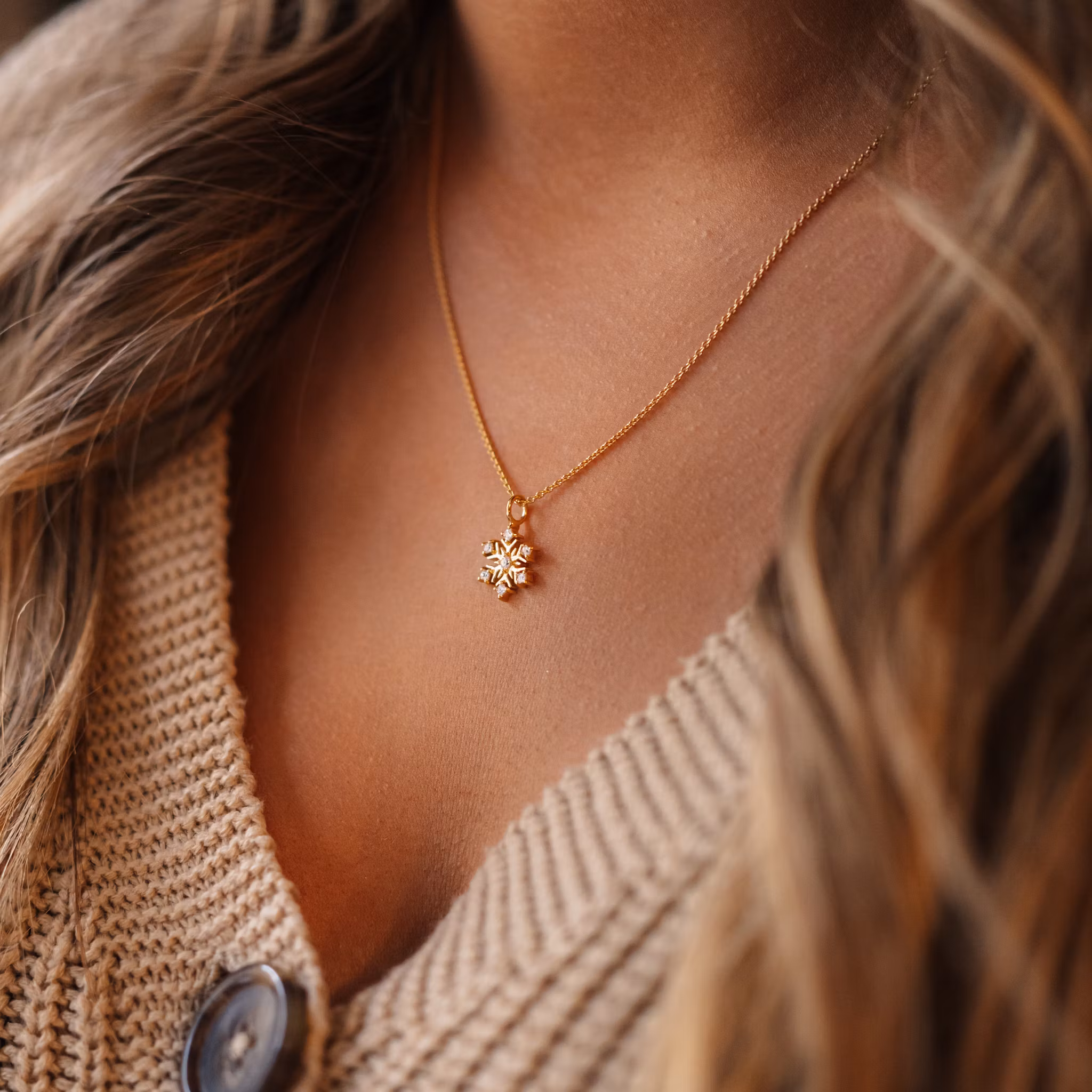 Snöflinga halsband guld