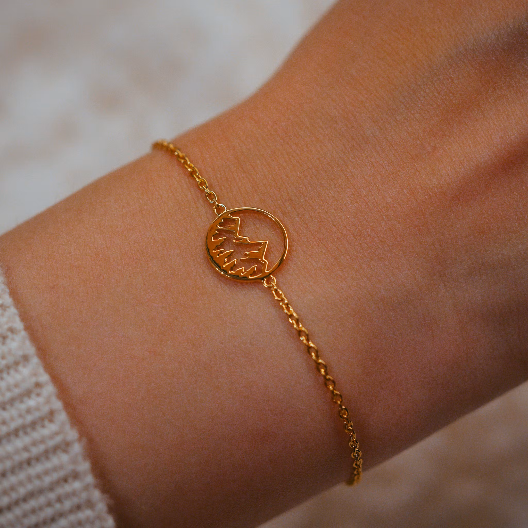 Fjäll armband guld