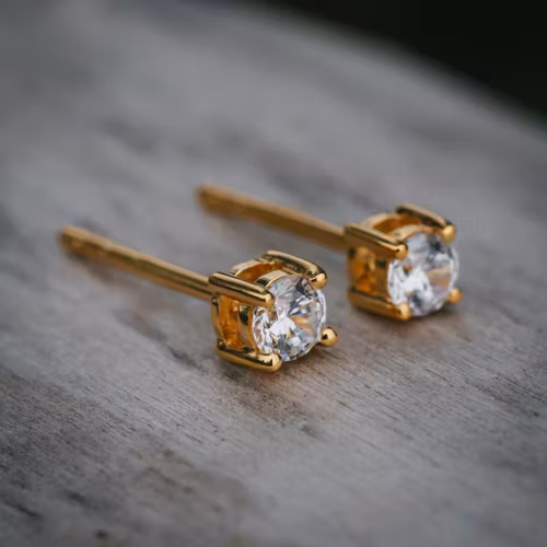 Gnista örhängen guld