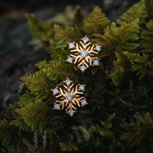 Snöflinga örhängen guld