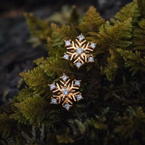 Snöflinga örhängen guld
