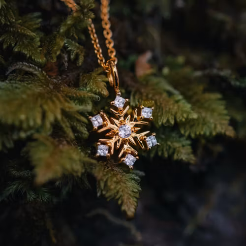 Snöflinga halsband guld