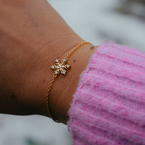 Snöflinga armband guld