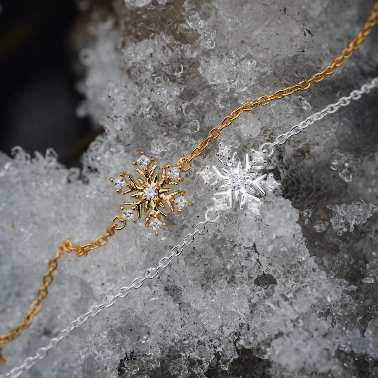 Snöflinga armband guld