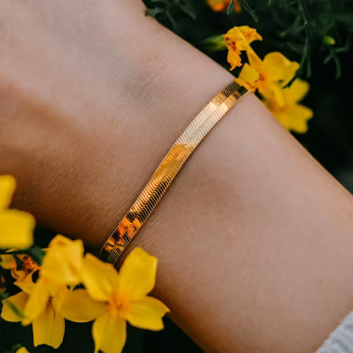 Flöda armband guld - Outlet