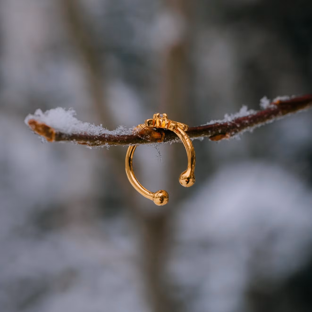 Snöflinga earcuff guld