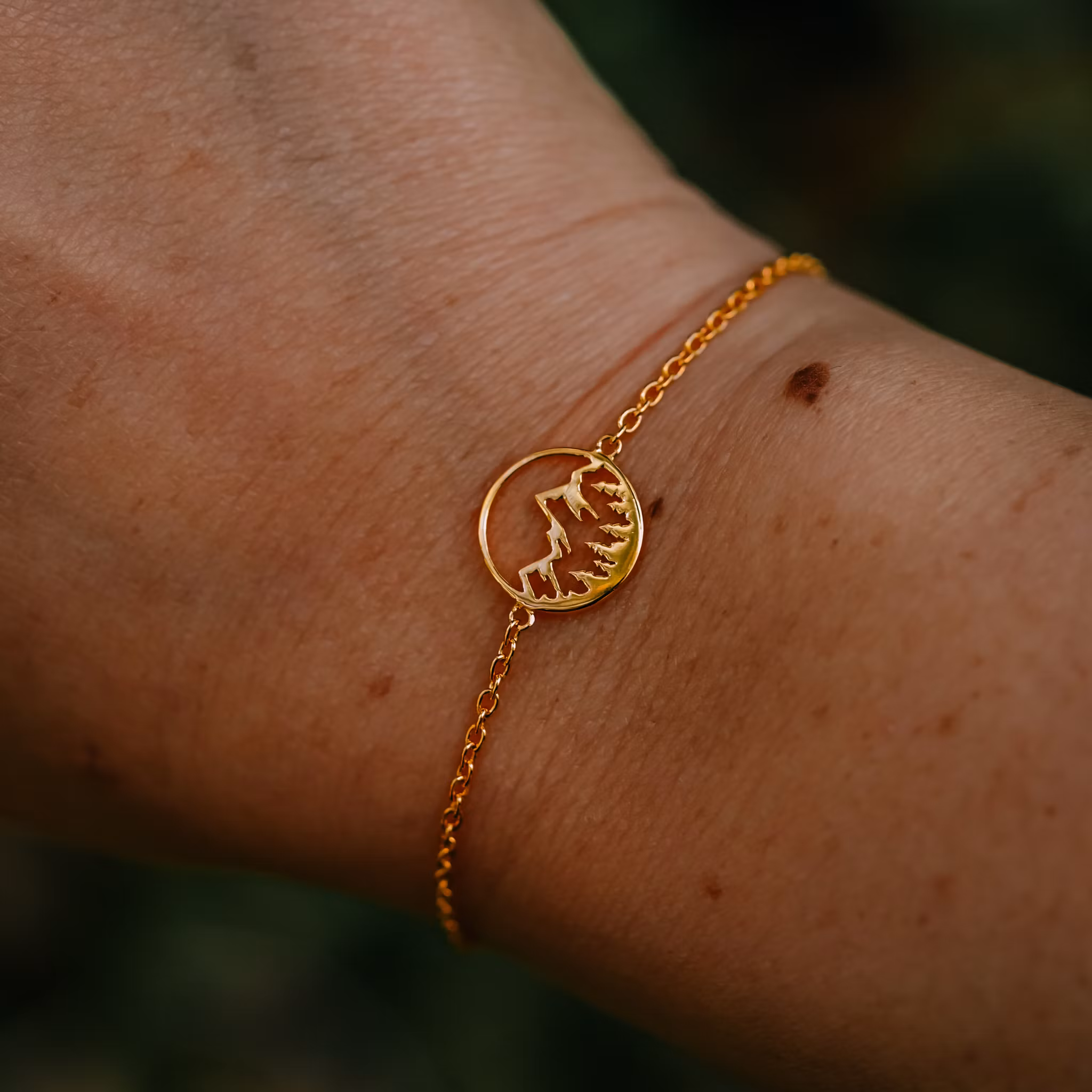 Fjäll armband guld