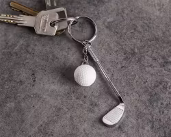 Nyckelring golfboll och golfklubba
