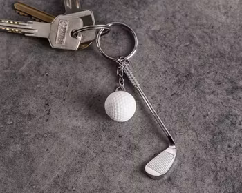 Nyckelring golfboll och golfklubba