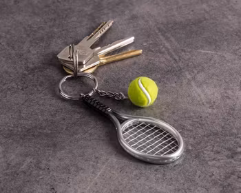 Nyckelring tennisboll och tennisracket