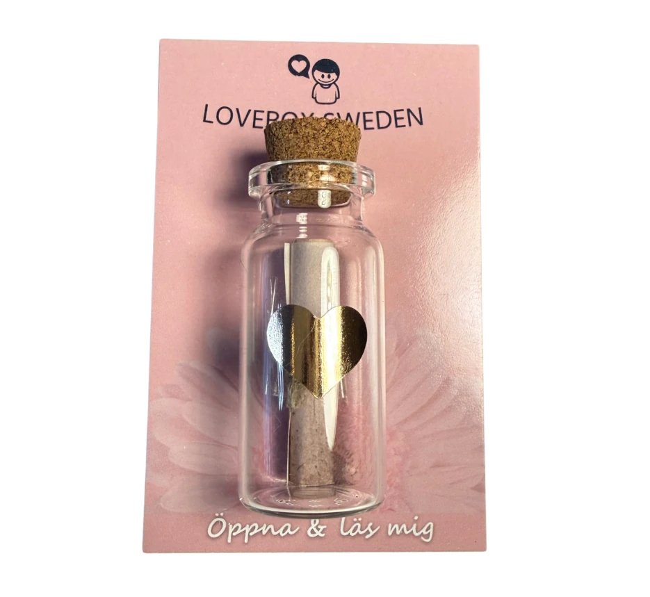 Liten glasburk med korklock för personligt meddelande