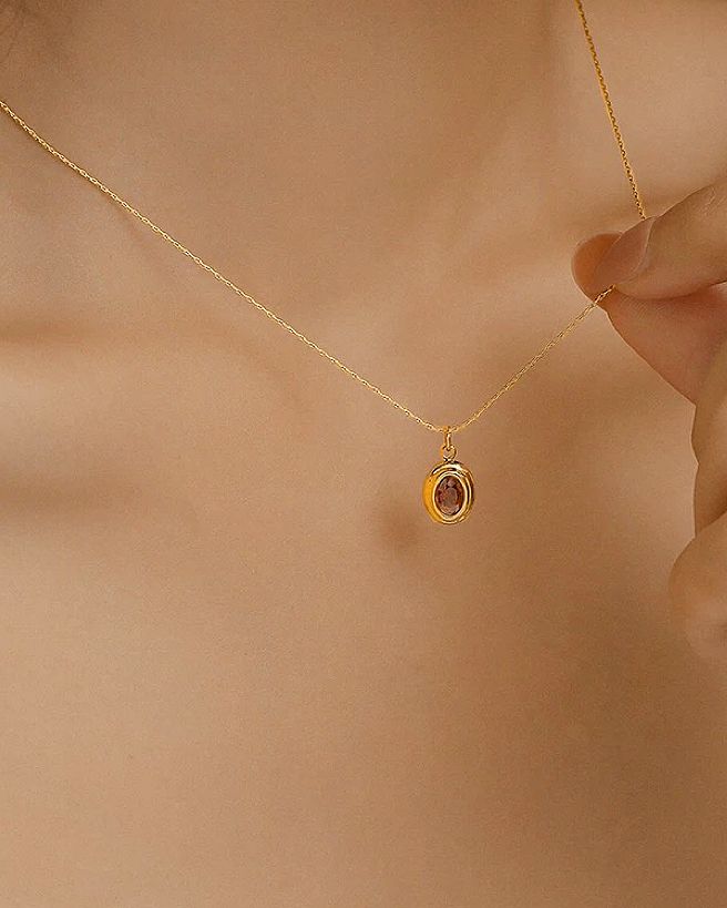 Halsband i stål med 18k guld med röd Cubic Zirconia