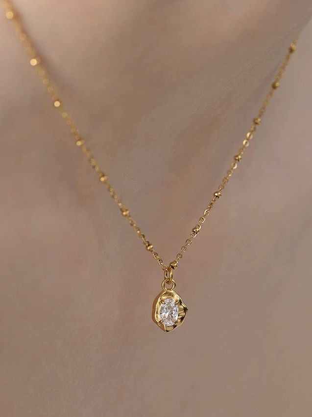 Halsband i stål med 18k guld med Cubic Zirconia