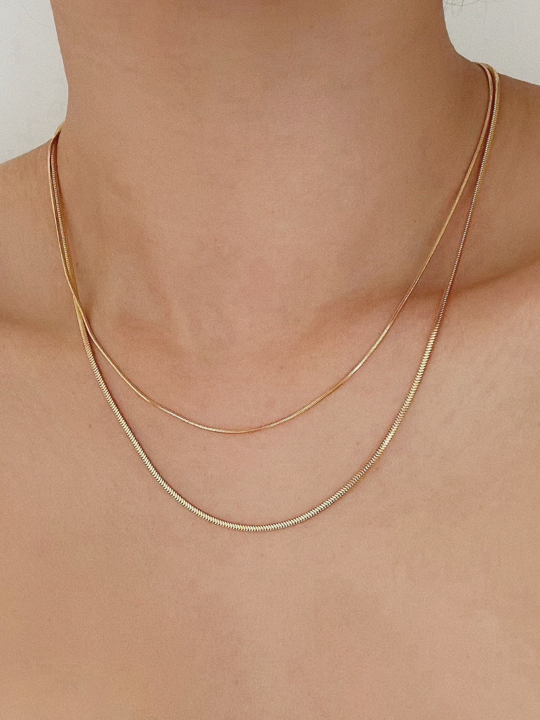 Halsband i stål med 18k guld med ormkedja 1,2 mm