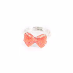 Barnring med en rosa glittrig rosett