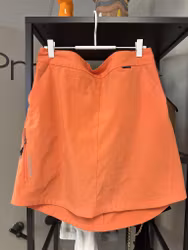 Orange golfkjol stl 40