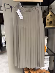 Beige plisserad kjol stl 40