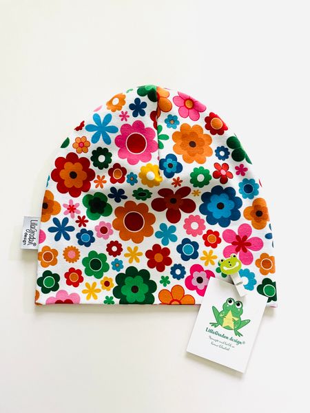 baggymössa Blommor Färgmix strl 46/48 - Uppsytt