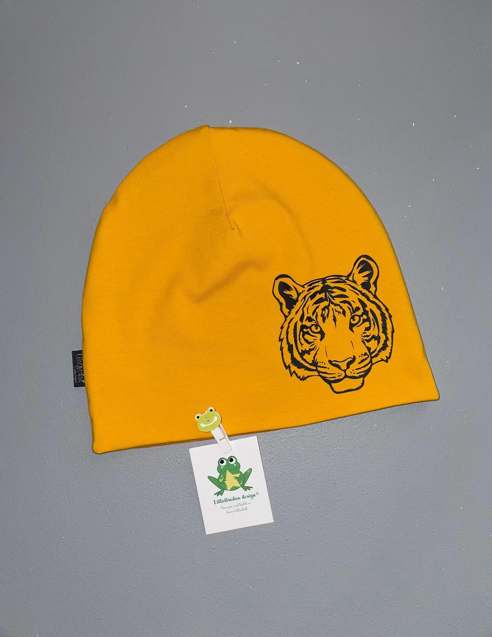 Motivmössa, motiv 6, reflex