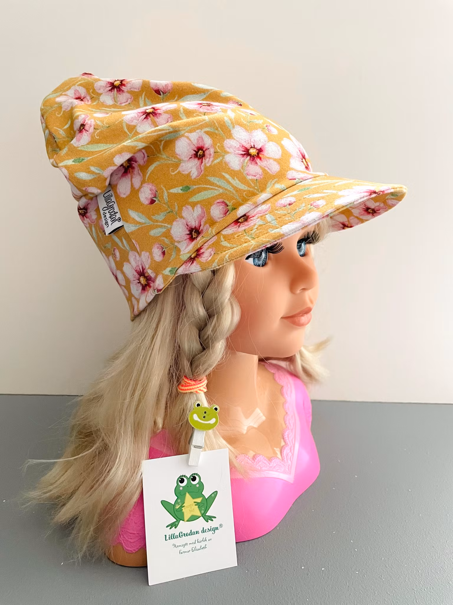 Meps, tyg Malvablommor ockra