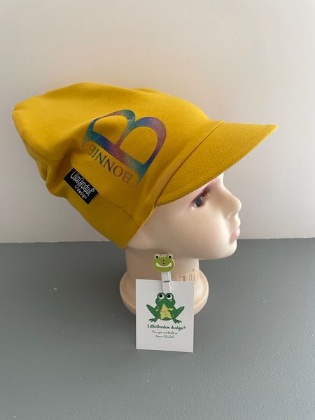 Bokstav/Namn-mössa, Senap m Glittervinyl Regnbåge - tryck höger sida