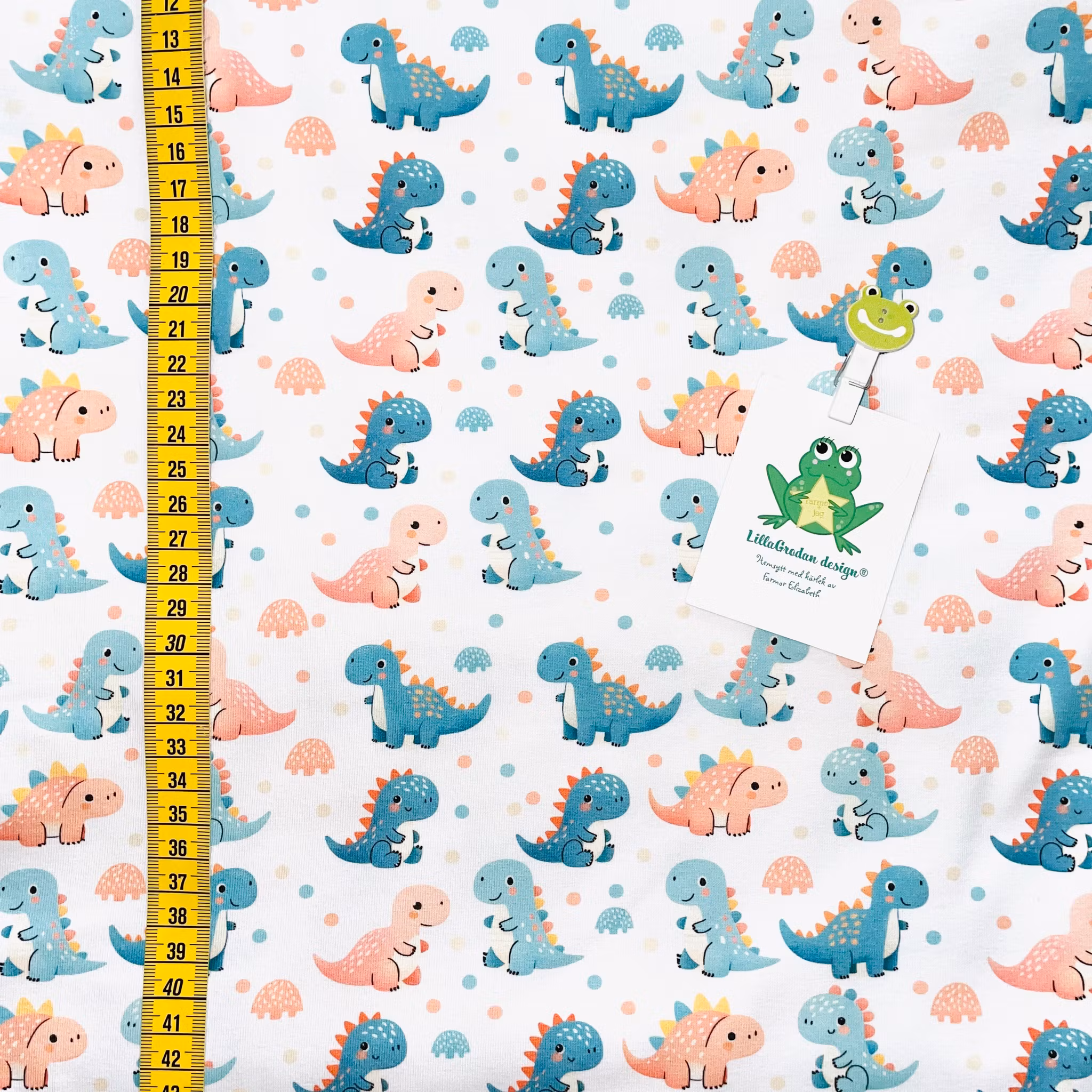 Tyg till baggymössa - MiniDinos, Vit #684