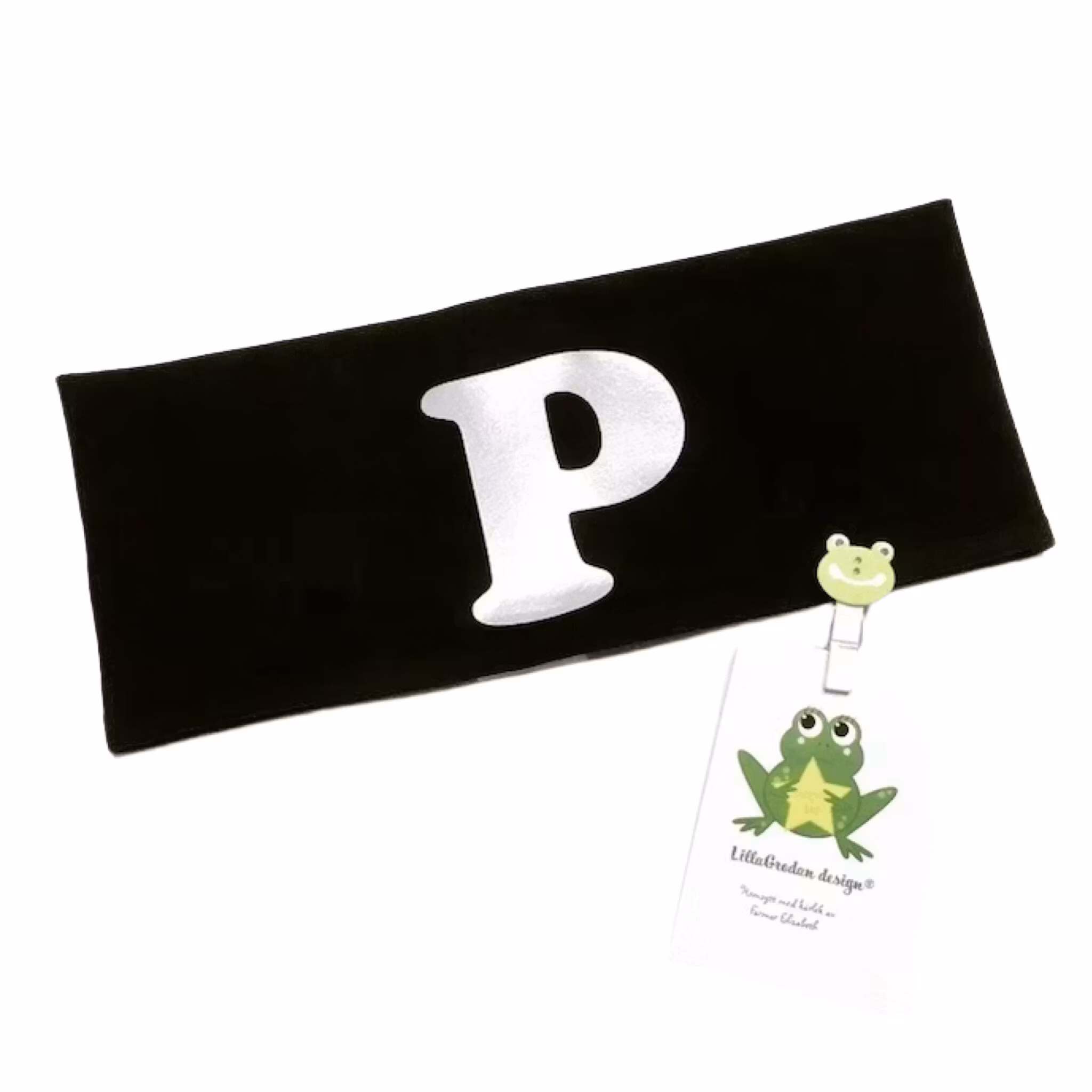 Pannband med bokstav i typsnitt 1, reflexvinyl