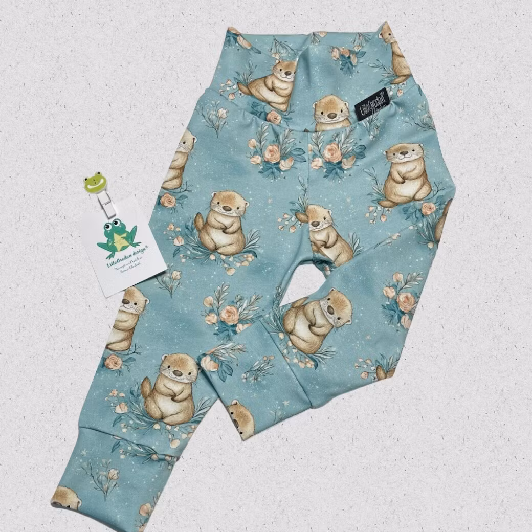 Joggingbyxa i tyg Uttrar. Storlek 62 - Uppsytt!