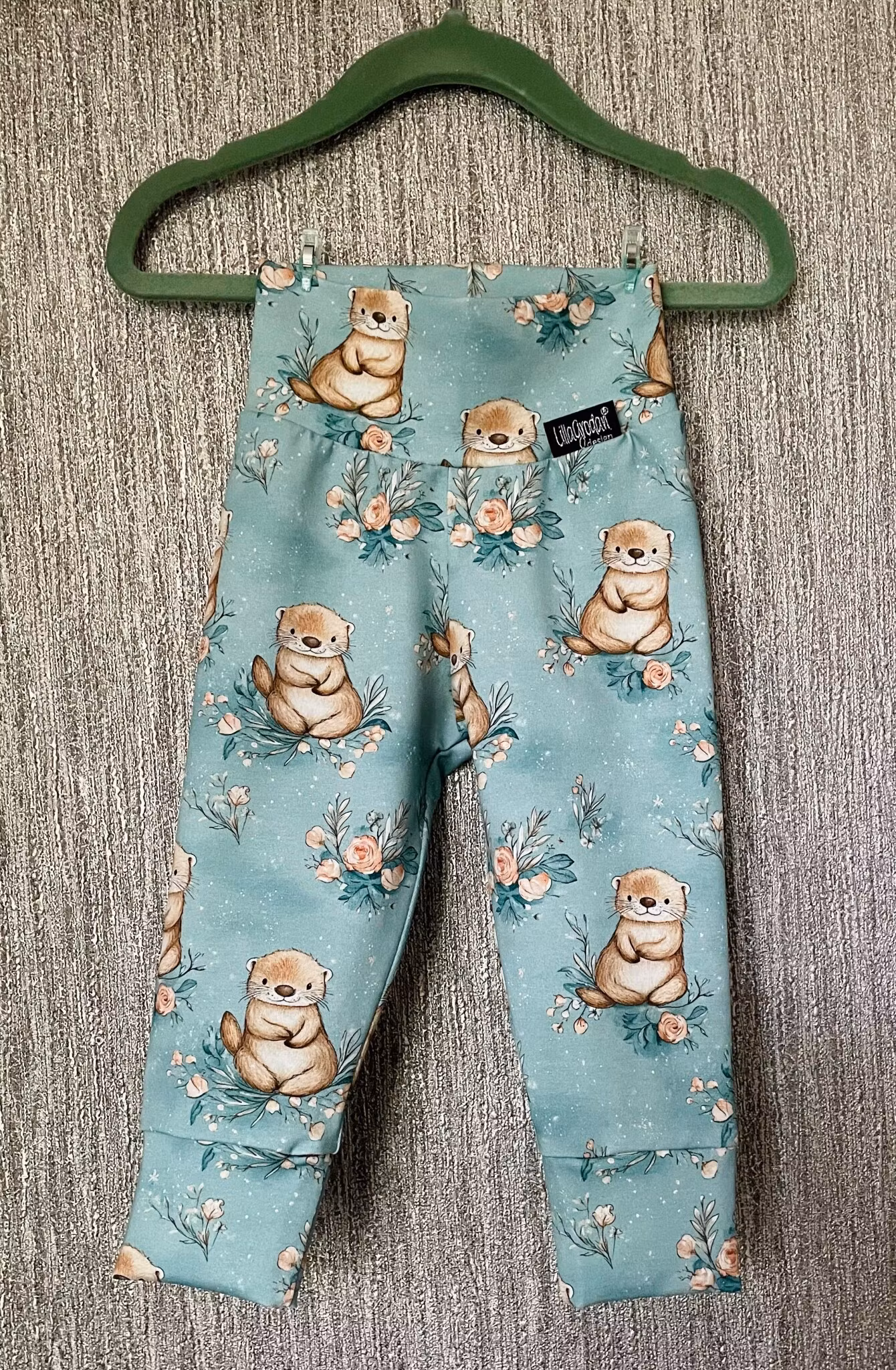 Joggingbyxa Uttrar, bild 2. Storlek 62 - Uppsytt!