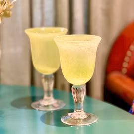 Ett par glas på fot SIA NOS