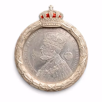 Brosch med 2-kronors jubileumsmynt Oscar II i silver 1897