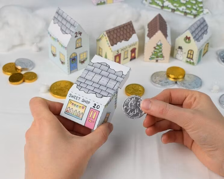 Julkalender vika ihop små hus